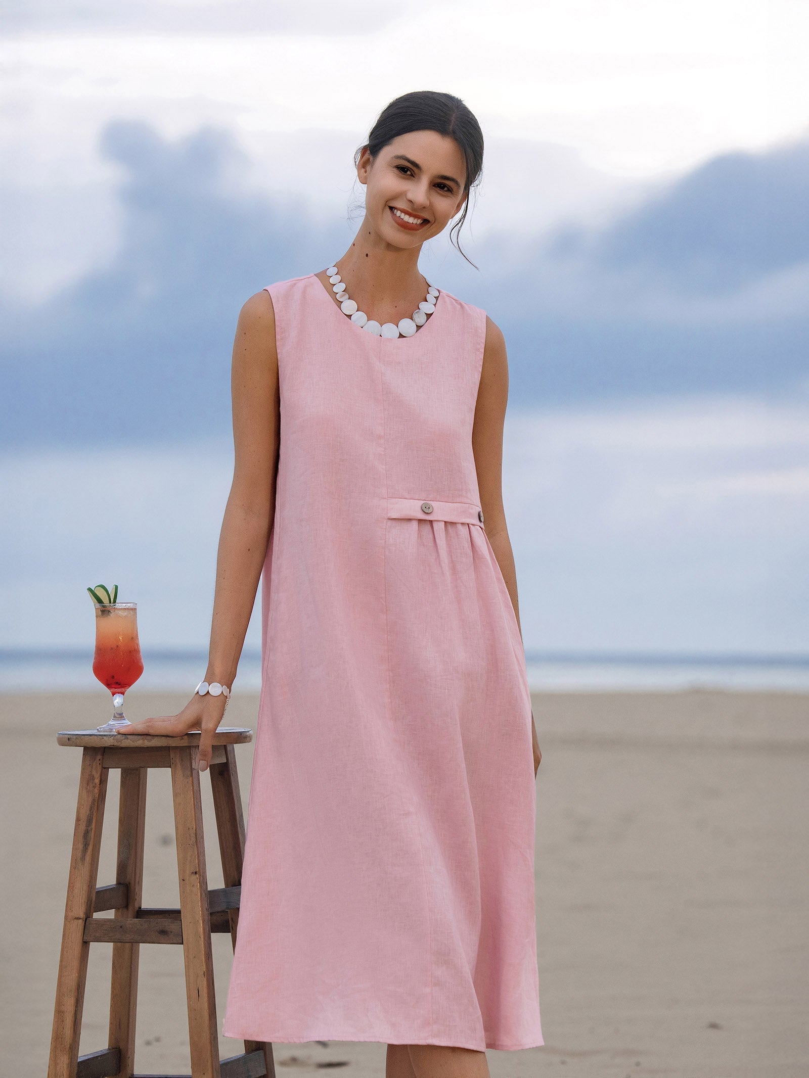 Elisabeth - Vestido midi sin mangas clásico con pliegues.